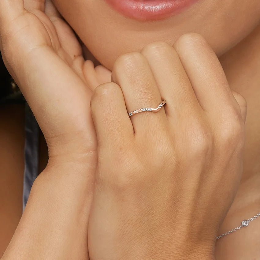 Rayonu Astra Contour Diamond Ring stacked with other wedding bands