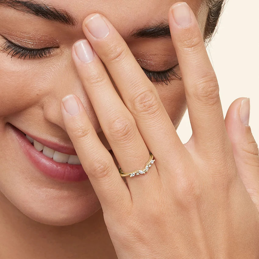 Lifestyle image of Rayonu Lab Diamond Ring stacked with other rings