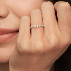 Side view of Rayonu Curved Versailles Ring showing curved chevron design