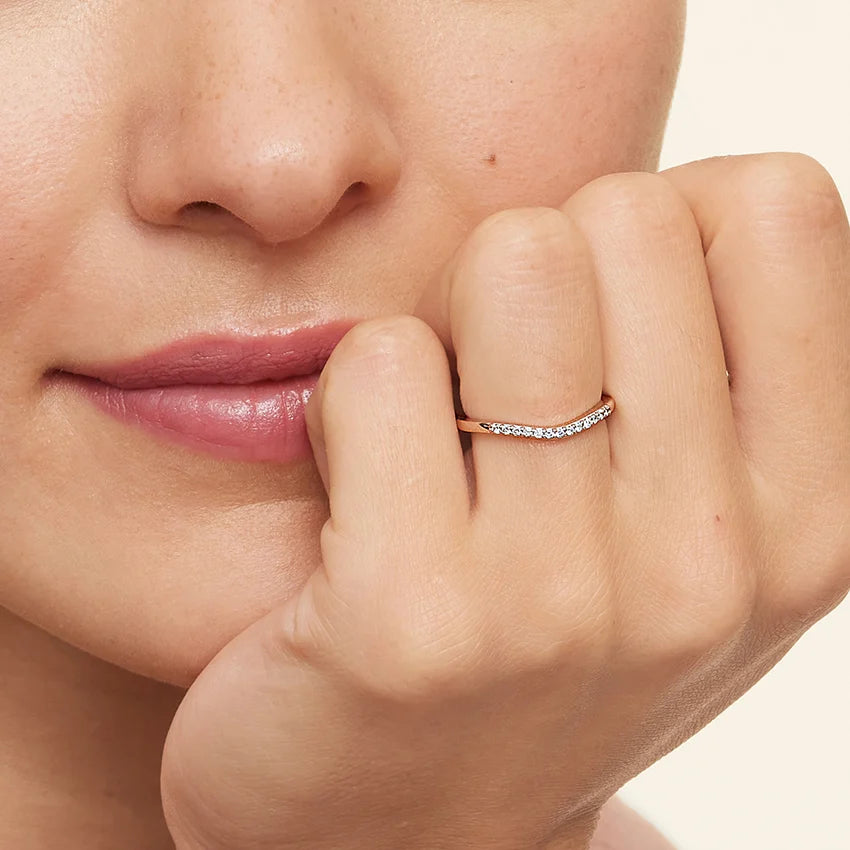 Rayonu Petite Curved Lab Diamond Ring stacked with other rings