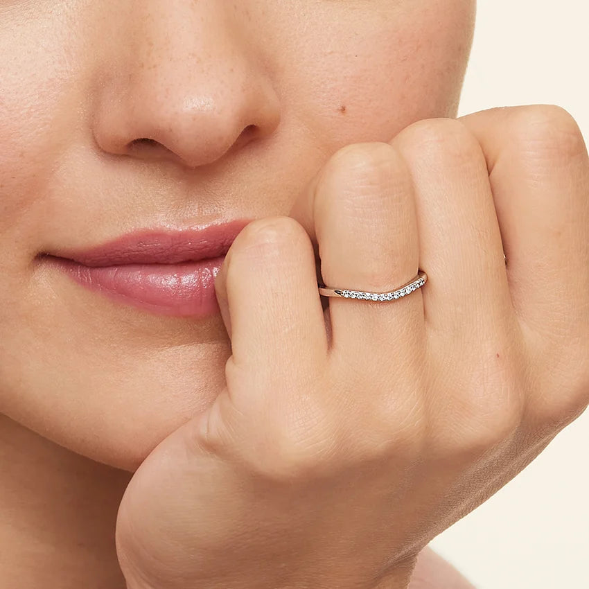 Side view of Rayonu Petite Curved Ring showing elegant curve design