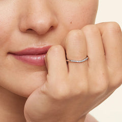 Side view of Rayonu Petite Curved Ring showing elegant curve design